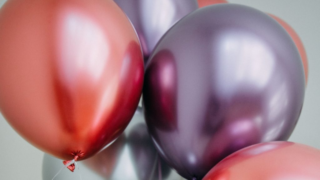 multicolored metallic helium balloons