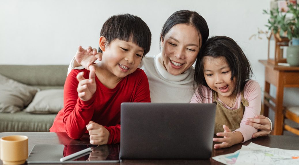 iLEAD Antelope Valley mom, son and daughter around laptop